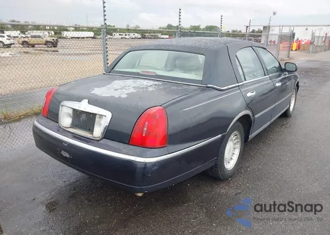 2000 Lincoln Town Car Executive из США, поврежденный, VIN 1LNHM81WXYY808762